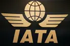 Logo of IATA featuring a globe with wings and the letters "IATA" below it.